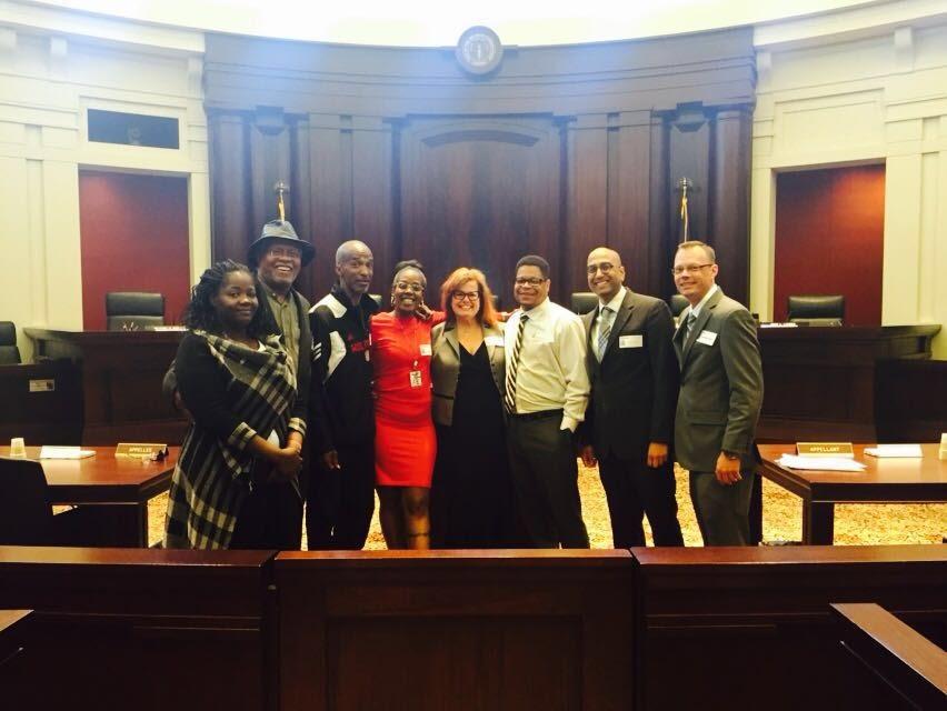 Dennis, Lesia, and Mecca testifying in Lansing thumbnail